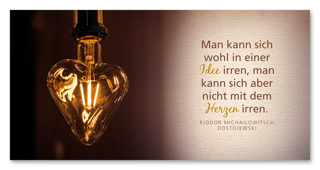 Schutzengel-Figur und Buch in einer Box